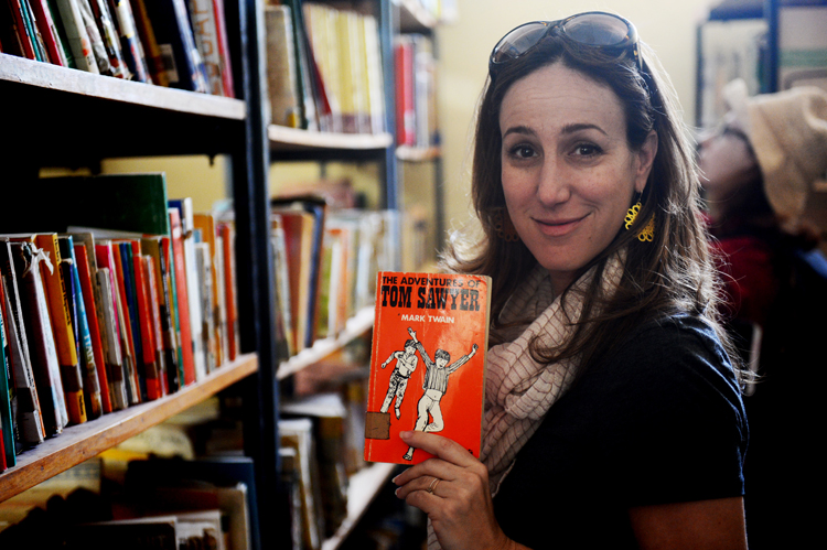 Liz  , recognizing a book at the Mojo Secondary School library.  The kids are taught in both English and Amharic.