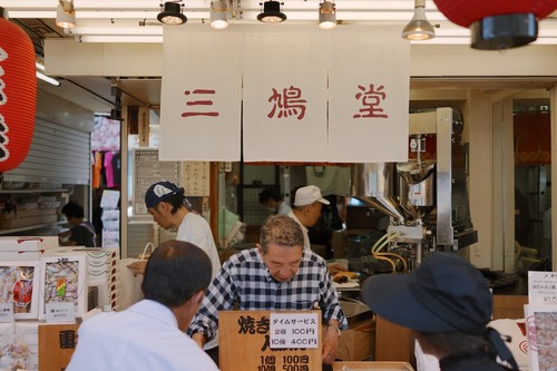 A Nakamise shop owner.