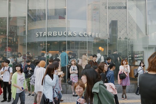 A flagship Starbucks store at the crossing.