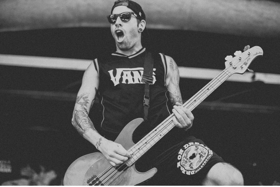 Bassist Jim Riley of LA metalcore band The Ghost Inside plays at Vans Warped Tour 2012 in Dallas, Texas.