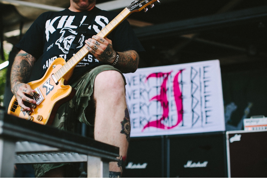 Andy Williams of Every Time I Die plays on the Monster Energy Stage at Vans Warped Tour 2012 in Dallas, Texas