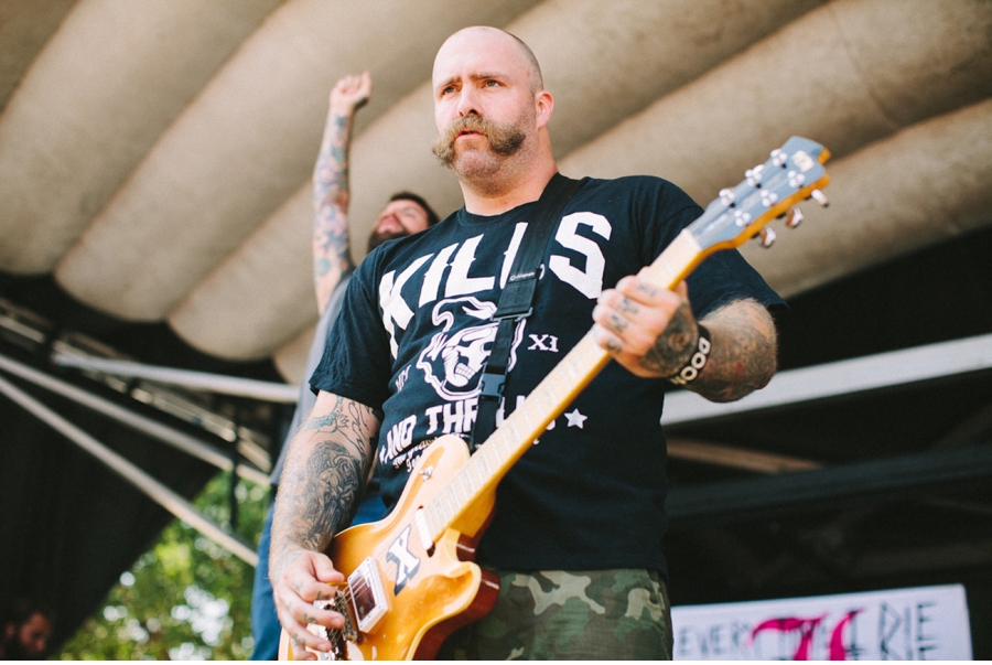 Andy WIlliams of Every Time I Die plays on the Monster Energy Stage at Vans Warped Tour 2012 in Dallas, Texas