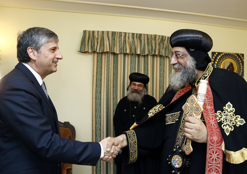 Click photo to download. Caption: Austrian politician Michael Spindelegger<br /><br />
with Pope Tawadros II of Egypt this June. Credit: Treffen mit<br /><br />
Papst-Patriarch Tawadros II.
