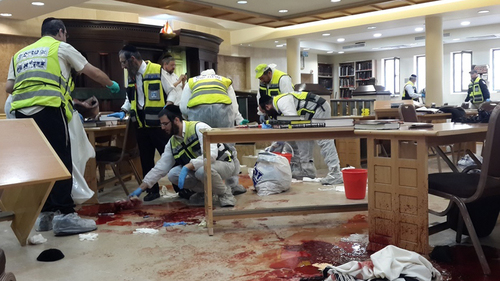 Click photo to download. Caption: Israeli ZAKA first responders at the site where two Palestinian terrorists on Tuesday entered the Kehilat Yaakov synagogue in the Jewish neighborhood of Har Nof, Jerusalem, with pistols and axes, and began attacking Jewish worshippers. Four Jewish worshippers were killed in the attack. Credit: ZAKA Spokesperson.