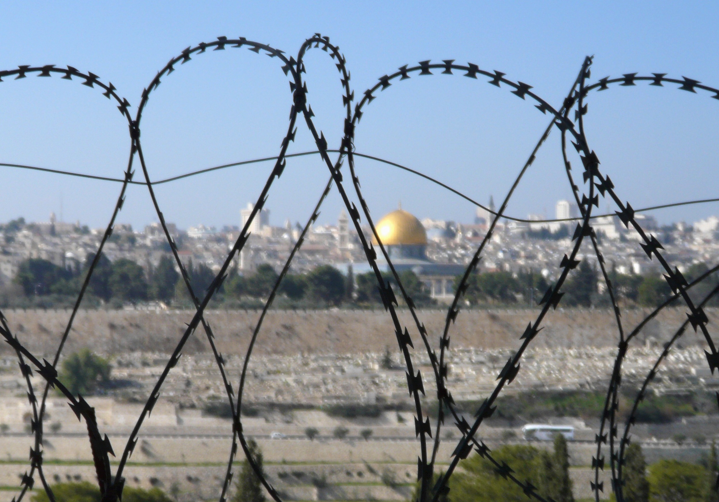 View of Jerusalem Old City through Barbed Wire