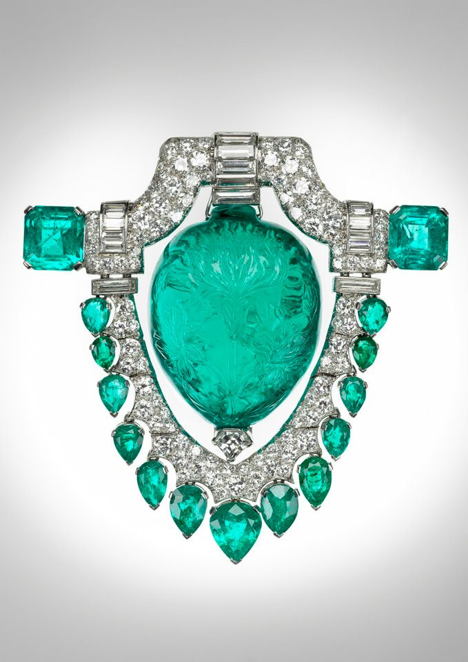 Marjorie Merriweather Post’s platinum brooch from the 1920s, featuring a spectacular 60-ct. carved Mughal emerald surrounded by diamonds.