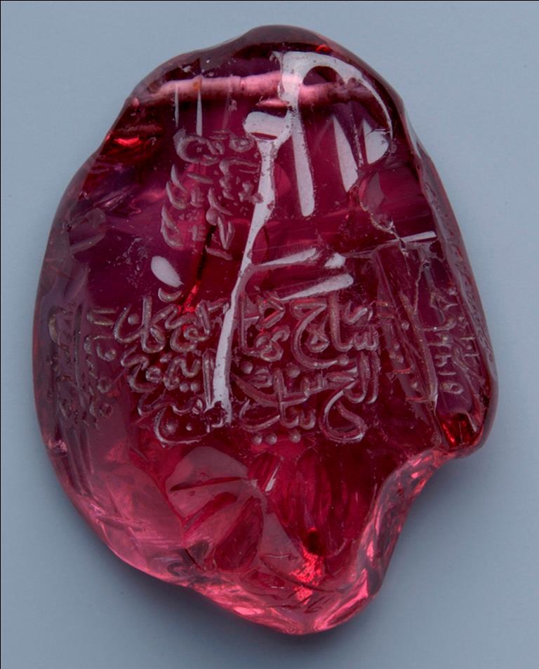 Inscribed royal spinel (balas ruby) weighing 249.3 carats. This majestic stone is inscribed with the names of its six imperial owners and has the distinction of having the second-most number of such inscriptions. It was a gift from the Safavid Shah Abbas the Great of Iran to the Mughal emperor Jahangir in 1621. Image courtesy of © The Al-Sabah Collection. Rulers mentioned in inscriptions: 1. Timurid, Ulugh Beg (before 1449) 2. Safavid, Shah Abbas I (1617) 3. Mughal, Jahangir (1621) 4. Mughal, Shah Jahan (undated) 5. Mughal, Alamgir (Aurangzeb) (1659 – 1660) 6. Durrani, Ahmad Shah (1754 – 1755)