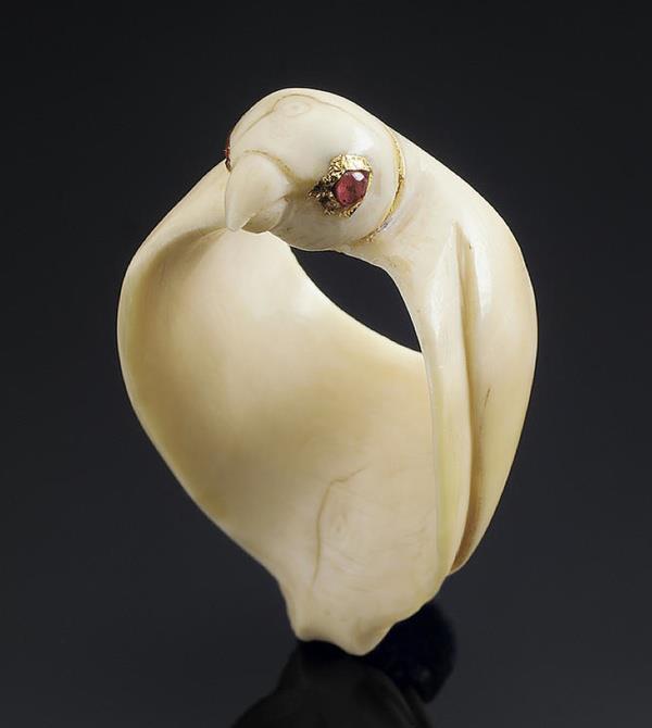 An unusual ivory Archer's Ring in the form of a Falcon probably Mughal, 18th Century formed by a three dimensional bird with ruby-set eyes and folded wings. Photo: Bonhams.