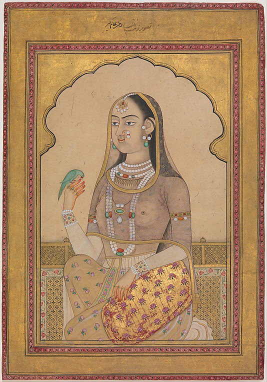 A Bejeweled Maiden with a Parakeet. Illustrated single work. ca. 1670–1700, Mughal. India, Golconda, Deccan. The bird sits on the maiden’s henna-reddened fingers, each one of which is separately adorned by a diamond ring. She also wears strands of pearls, with emeralds and rubies.