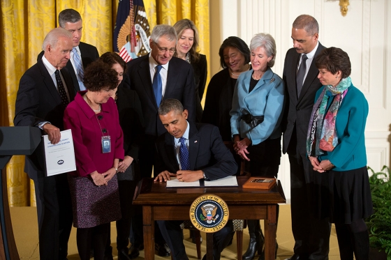 President Barack Obama signs the Campus Sexual Assault Presidential Memorandum during a White House Council on Women and Girls meeting in the East Room of the White House, Jan. 22, 2014. (Official White House Photo by Lawrence Jackson)    