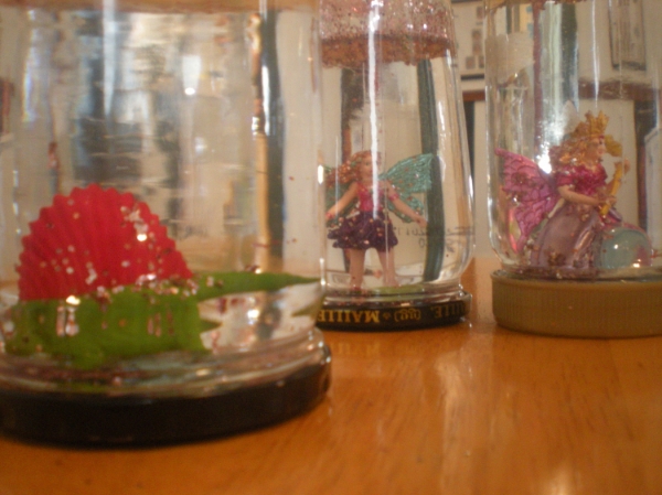 dino and fairy snowglobes