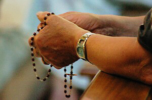 hands praying rosary 7 as m2