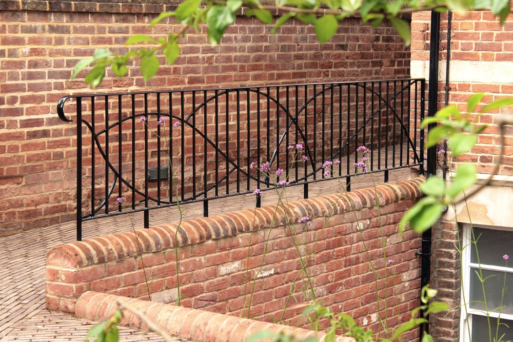 custom_iron_railings_curved_clay_pavers_porch_extension_rogue_designs_oxford