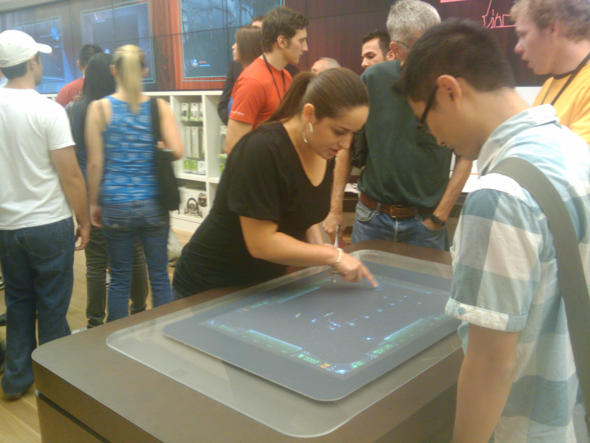 People playing with Surface (there were at least 2 others to play with too).