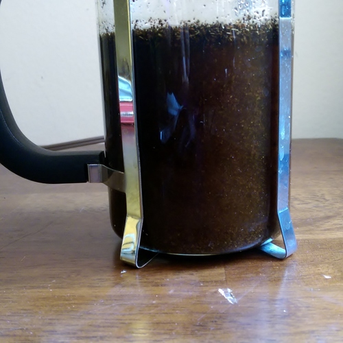 Allowing the tea syrup to steep in a French press versus in the pot reduces your chances of burning the sugar.