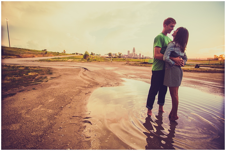 couple standing in a puddle together
