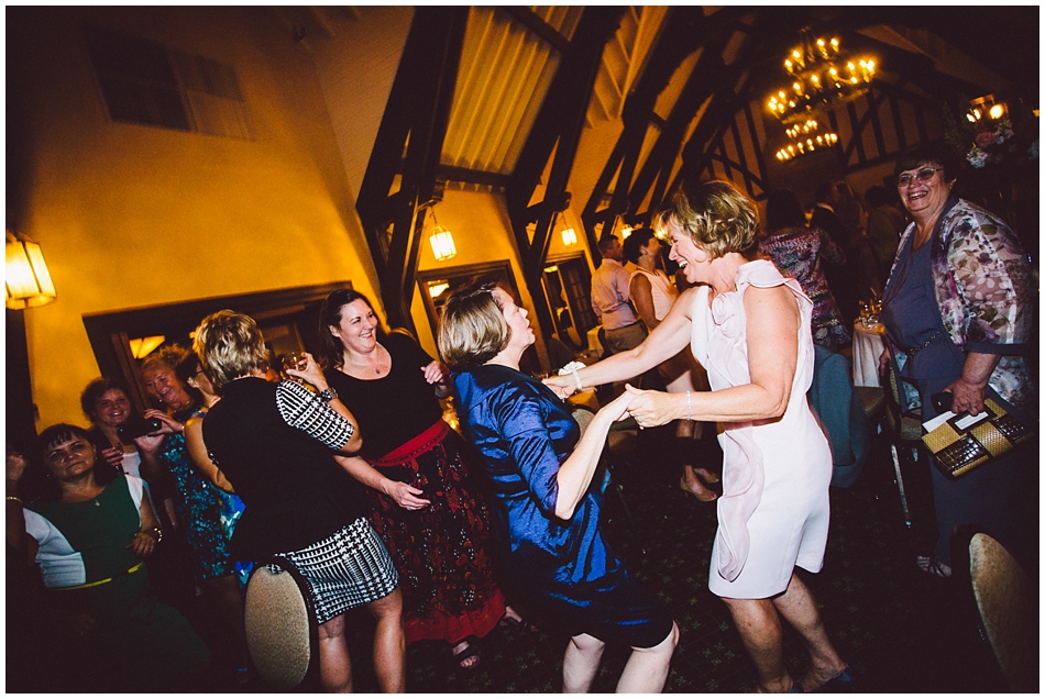 Mother of the bride and Mother of the groom dancing during wedding