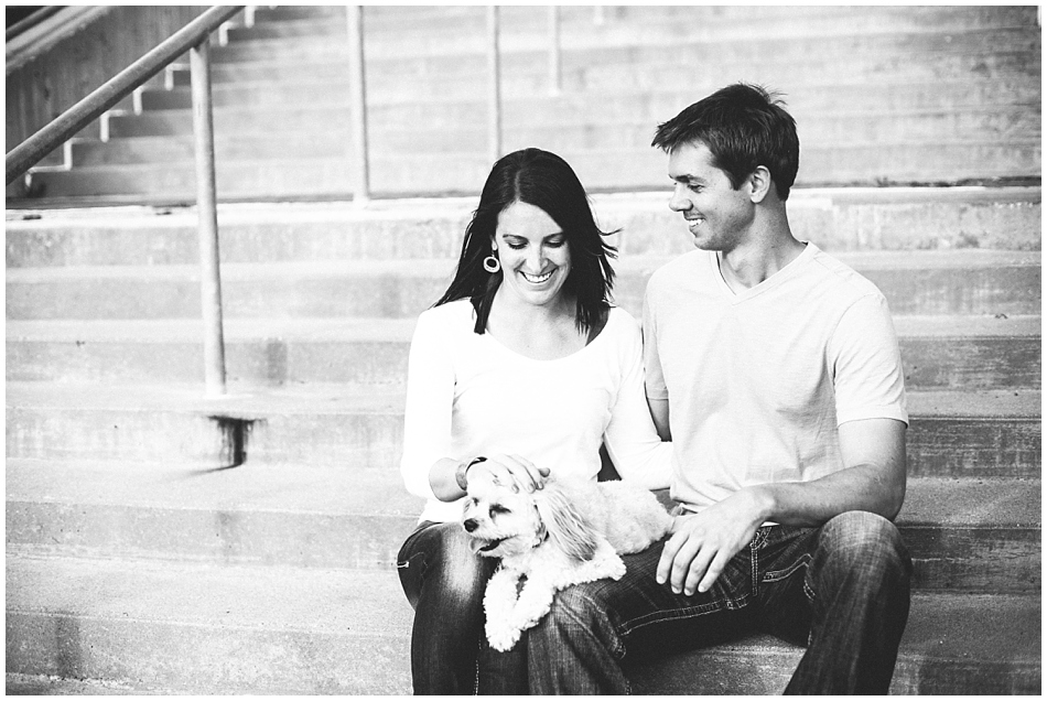 Engagement photos with dog - couple sitting on stairs