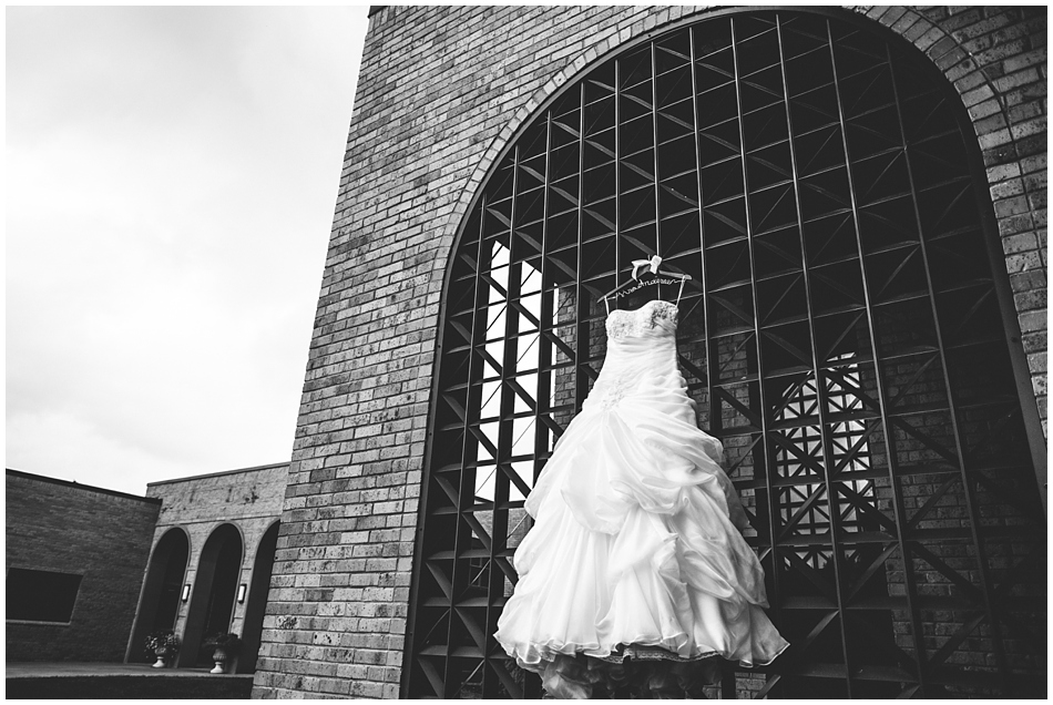 Wedding dress hanging at St. John Vianney, Amanda Kohler Photography, Omaha NE