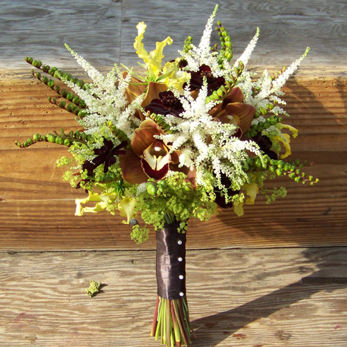 bridal bouquet with chocolate cosmos, chocolate cymbidiums, montbretia pods, alchemilla, yellow gloriosa lilies and astilbe