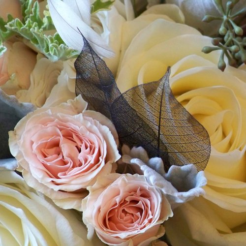 close up of skeleton leaves in the bridal bouquet