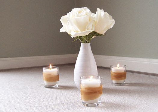 votives customized with gold organza ribbon