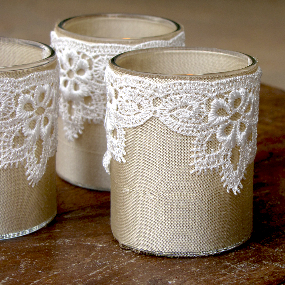 ivory silk and white lace wrapped votive glasses, perfect for your wedding