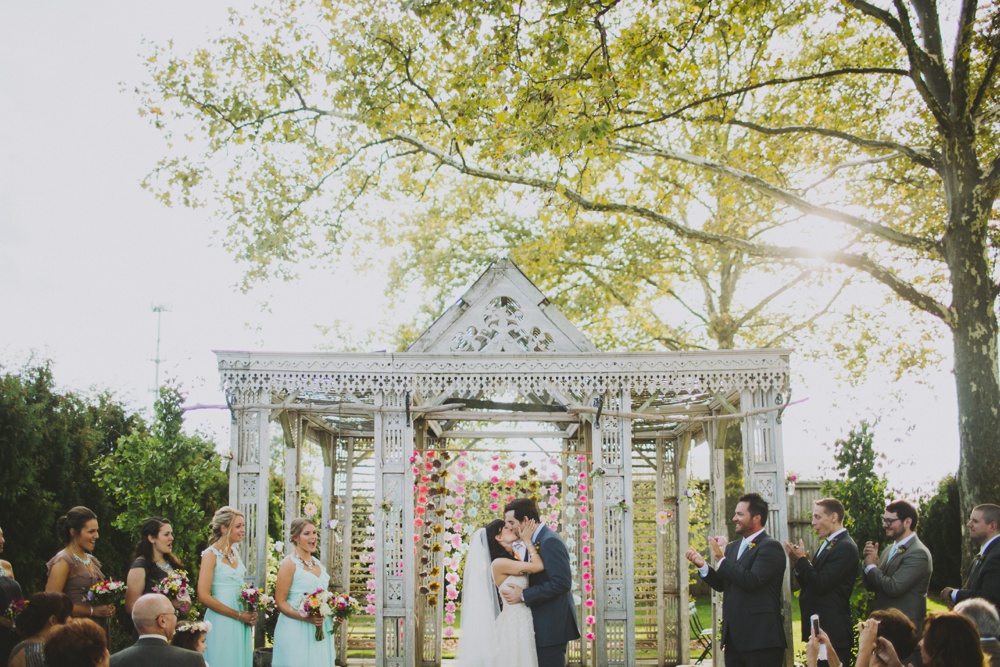 Wedding ceremony at Terrain at Styers, Glen Mills PA, Decorations: Love Lou Collective, Flowers: Green Meadows Florist, Philadelphia Wedding Photographers With Love & Embers