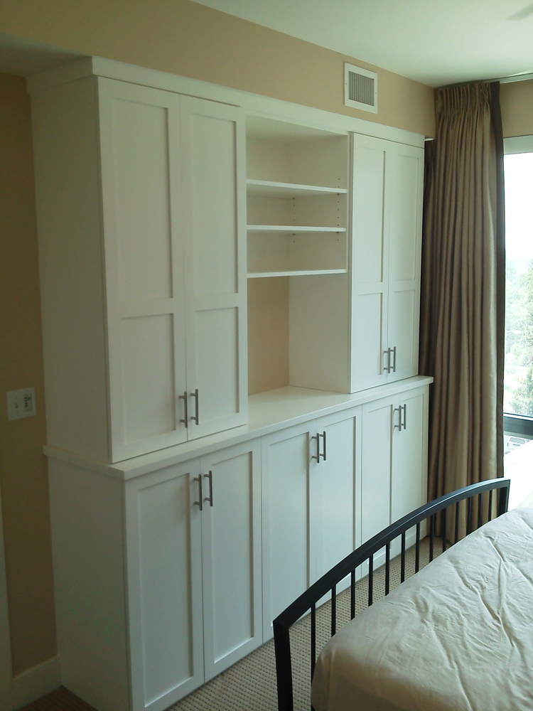 White lacquered wardrobe and display.