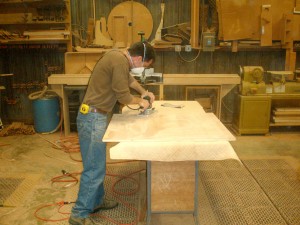 Randy sanding a panel to smooth perfection