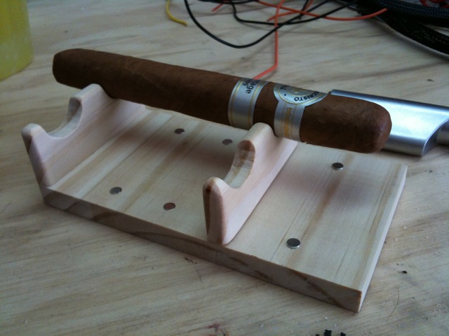 Adjustable cigar holder complete with rare earth magnets