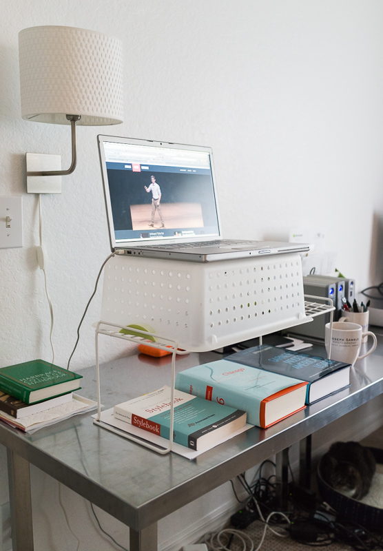 image of a laptop on a stand on top of desk