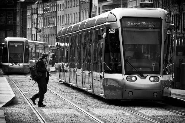 Man Crossing In front of the Luas