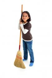 Cute girl with broom