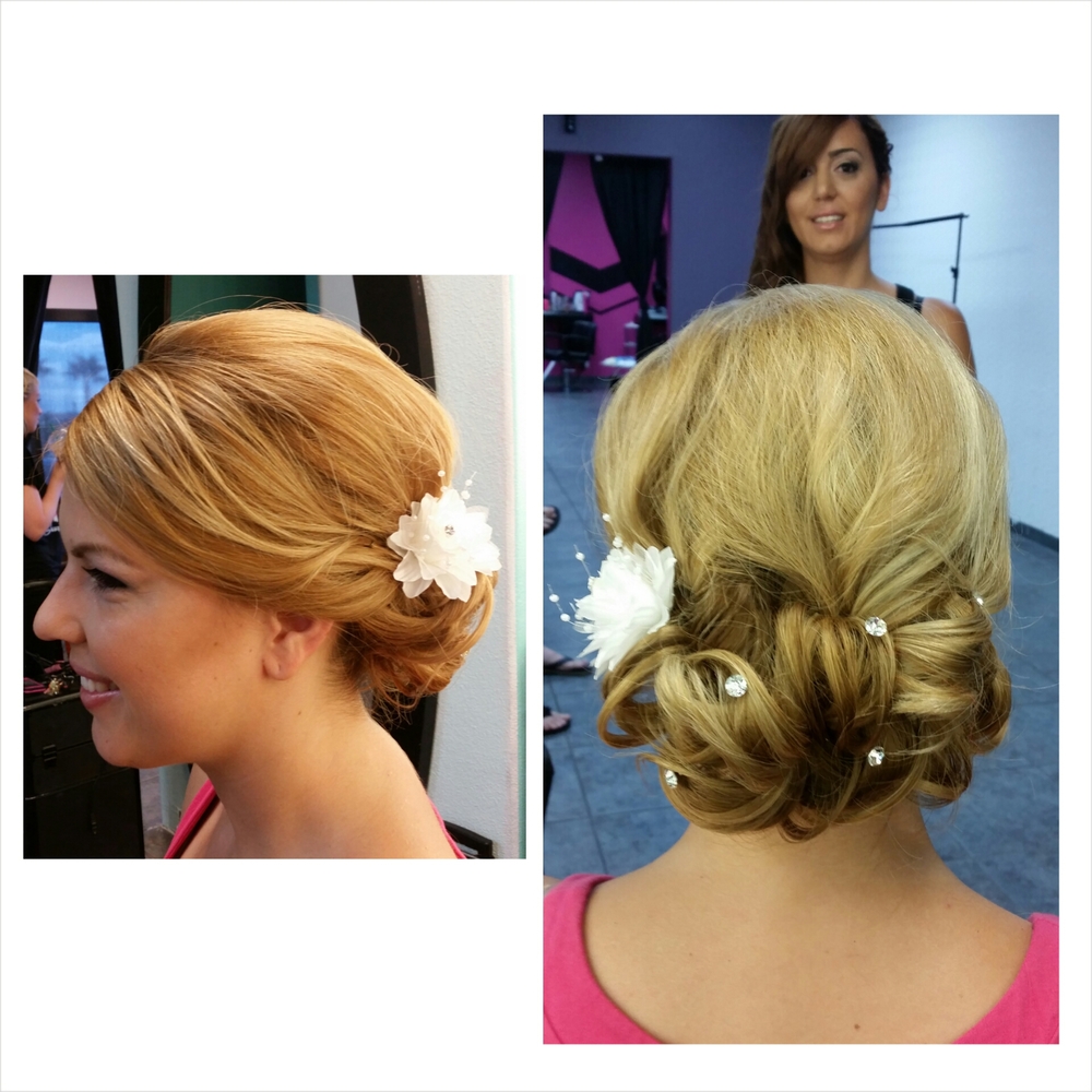 This is a classic elegant look great for adding accessories to. This bride's hair is actually a long A-line. The back of her hair only reaches just above her shoulders.  Hair texture needed: Medium to thick Hair length needed: All Types Recommendations: Having the curled bun low at the nape gives the opportunity for shorter hair to look longer and thicker.