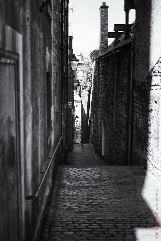narrow stone street scotland photography