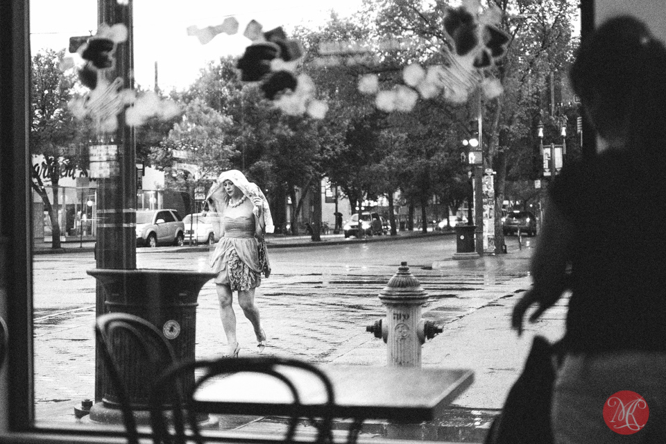 crossing street rain coffee street candid