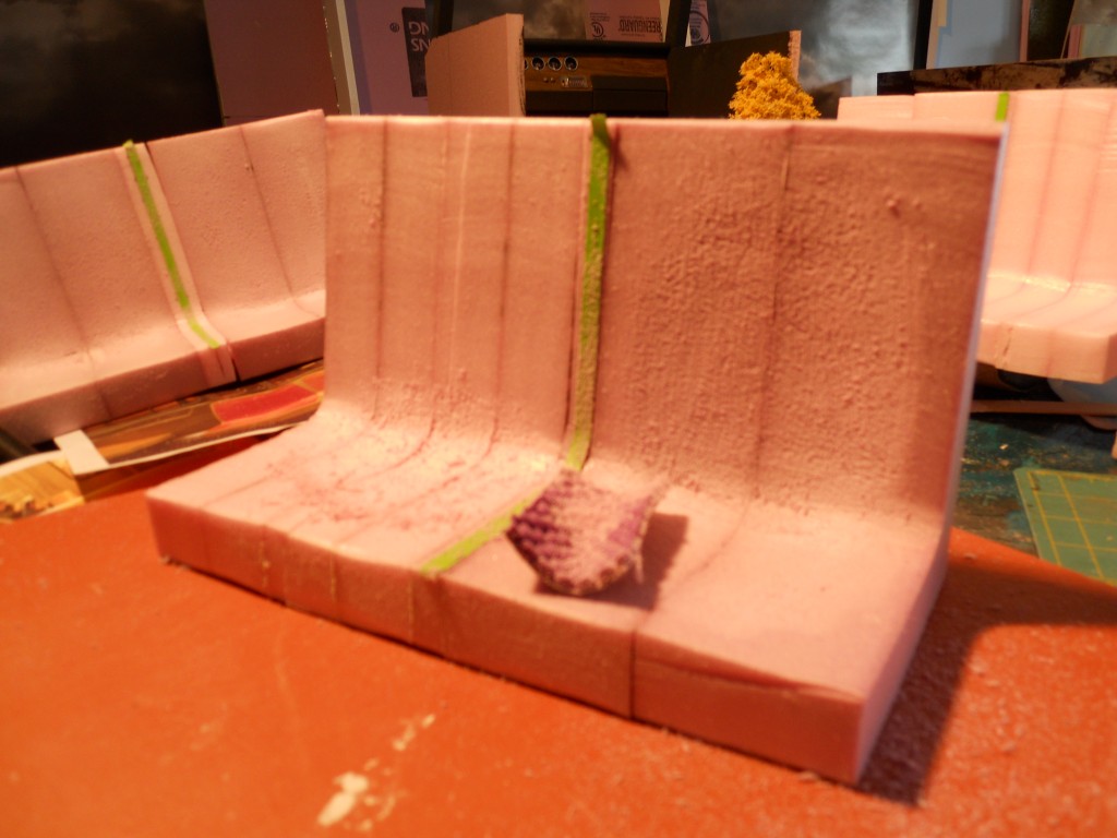 Subway seats-step 1. Glue together rough cut pieces of pink foam. Use hot-wire then sandpaper to shape. 