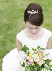 Pensive Bride Holding Her Bouquet