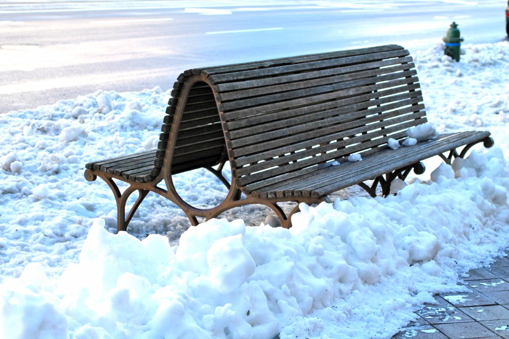 Lonely bench with snow