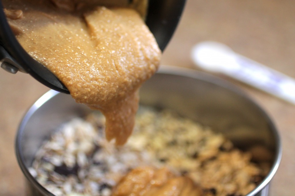 pouring in peanut butter and honey mixture