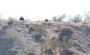 Armed men outside the Bundy ranch / Cliven and Carol Bundy