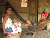 Antonio and his wife with their new baby in Darien, Panama