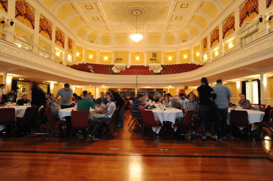 beginning Day Two at Webstock - Town Hall filling up, photographed from stage end out across the tables and into the Gallery