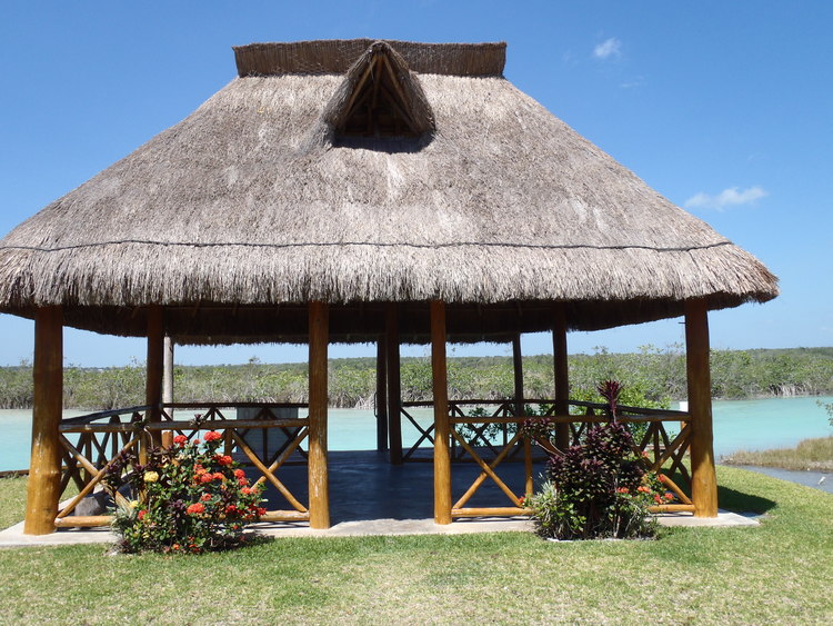 Riverfront palapa for your barbecue fiestas.