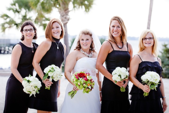 love the bridesmaids each in a different black dress to match their personal style | photo by www.chiphotographyofcharleston.com