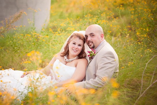 gorgeous lighting with a bride and groom in a field | photo by www.chiphotographyofcharleston.com
