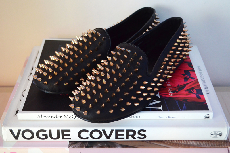 black loafers gold spikes