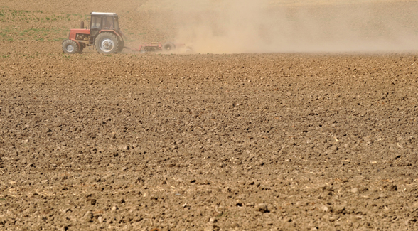 tractor on dirt, southwest drought farming, water 2025