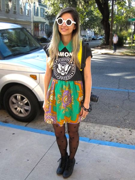 Jackie Gasc, SCAD student and Fashion blogger wearing an oriental print dress, black stockings and big white round